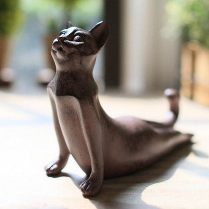 Estatuas de yoga de gatos