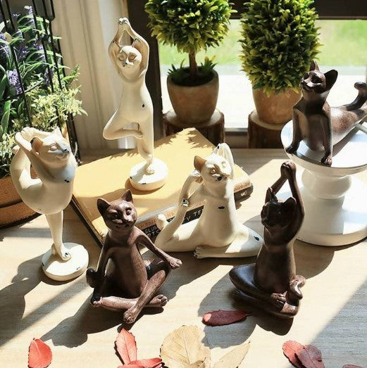 Estatuas de yoga de gatos