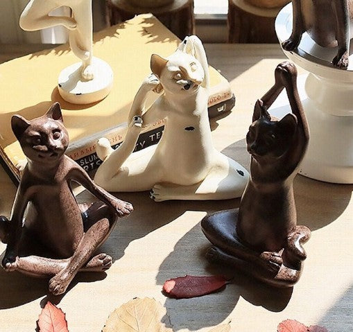 Estatuas de yoga de gatos