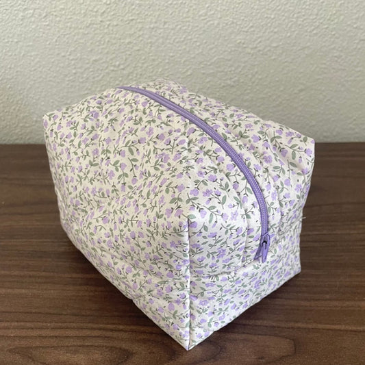 Bolsa de viaje para maquillaje con diseño floral
